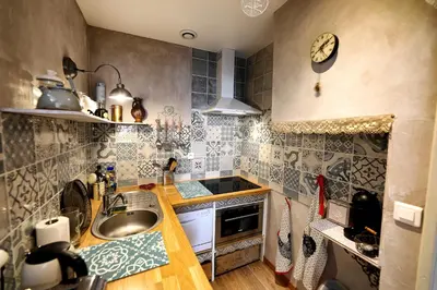 Cuisine ou kitchenette dans l'établissement L'Aristoloche