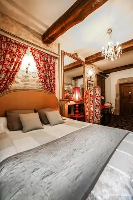 Un ou plusieurs lits dans un hébergement de l'établissement Chambre d'hôtes Le Petit Tertre