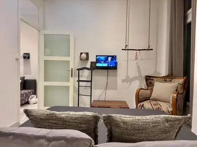 Télévision ou salle de divertissement dans l'établissement Centre Historique Dijon - Le Patio