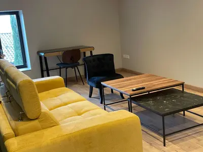 Coin salon dans l'établissement Au Petit Bonheur chez Bambina