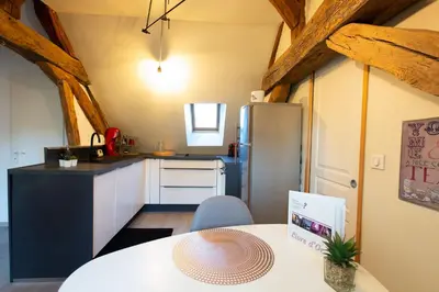 Cuisine ou kitchenette dans l'établissement Loveappart21 Pimentez votre vie de couple