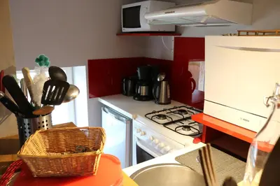 Cuisine ou kitchenette dans l'établissement Gite Le Meix Chapeau