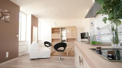 Télévision ou salle de divertissement dans l'établissement Le Corton de Beaune, appartement classé 3 étoiles