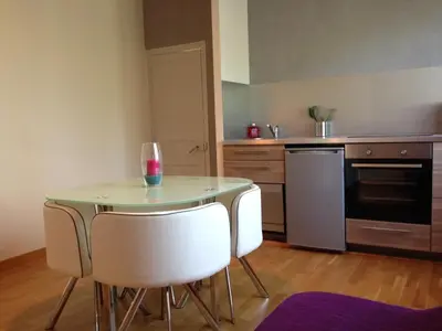 Cuisine ou kitchenette dans l'établissement La Conciergerie du Manoir