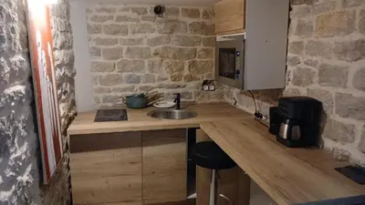 Cuisine ou kitchenette dans l'établissement Luxury Suite Lilas