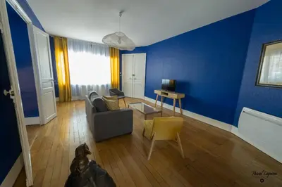 Coin salon dans l'établissement Appartement aux remparts des Hospices
