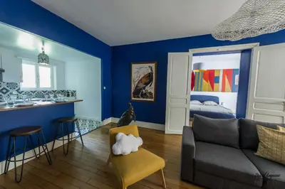 Coin salon dans l'établissement Appartement aux remparts des Hospices