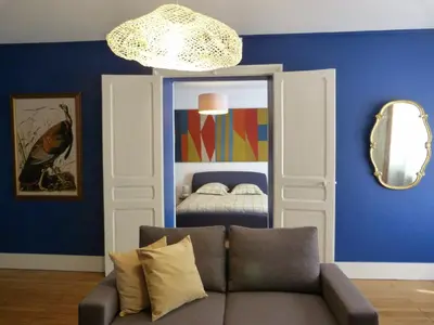 Coin salon dans l'établissement Appartement aux remparts des Hospices