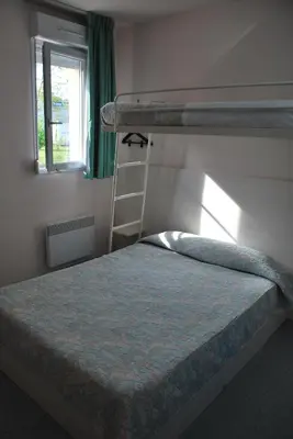 Un ou plusieurs lits dans un hébergement de l'établissement Europe Hotel