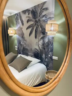 Un ou plusieurs lits dans un hébergement de l'établissement Hôtel du Lion d'OR