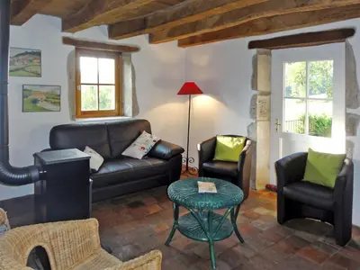 Coin salon dans l'établissement Holiday Home Premier gîte de Bouton by Interhome