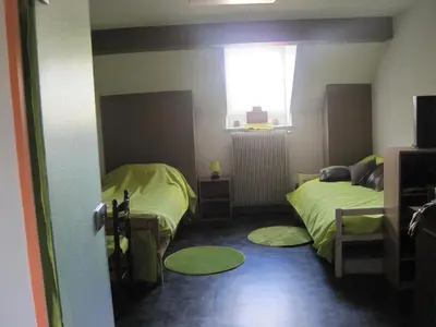 Un ou plusieurs lits dans un hébergement de l'établissement Maison Saint Louis