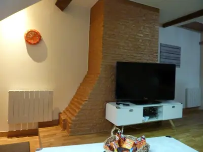 Télévision ou salle de divertissement dans l'établissement Chez Christian au coeur du val de saone