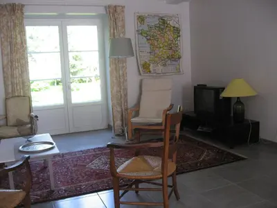 Coin salon dans l'établissement Gite Le Village