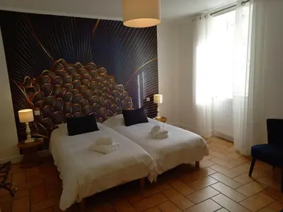 Un ou plusieurs lits dans un hébergement de l'établissement Hotel de la Halle