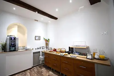 Cuisine ou kitchenette dans l'établissement Hôtel Le Chambellan