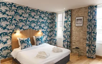 Un ou plusieurs lits dans un hébergement de l'établissement Castel de Très Girard - Hotel & Restaurant - Teritoria