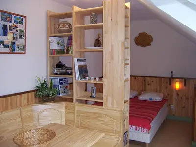 Un ou plusieurs lits dans un hébergement de l'établissement La maison de poupet