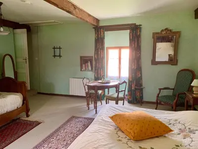 Un ou plusieurs lits dans un hébergement de l'établissement CHAMBRES D' HOTES LA LISON
