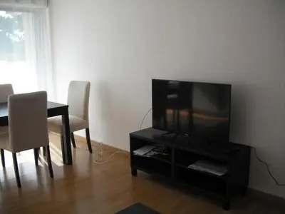 Télévision ou salle de divertissement dans l'établissement Residence Le Vendome