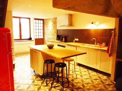 Cuisine ou kitchenette dans l'établissement Chez Henriette