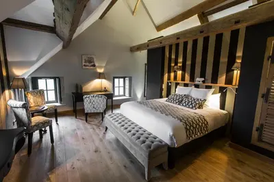 Un ou plusieurs lits dans un hébergement de l'établissement Domaine de Rymska & Spa - Relais & Châteaux