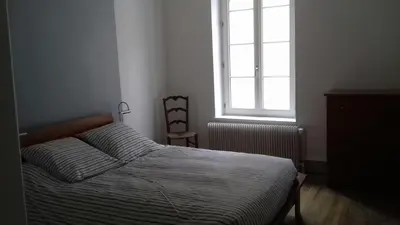 Un ou plusieurs lits dans un hébergement de l'établissement Gite Au Coeur De Volnay