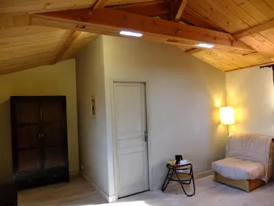 Coin salon dans l'établissement La Pierre Folle Chambres d'Hôtes