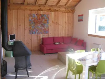 Coin salon dans l'établissement Gîte chez karine et roland