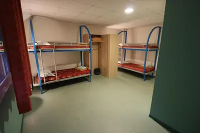Un ou plusieurs lits dans un hébergement de l'établissement ETHIC ETAPES DIJON Accueil 24h24 et parking gratuit