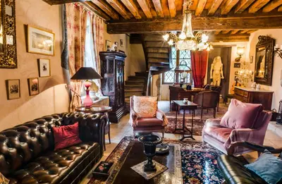 Coin salon dans l'établissement Le Moulin Rénové