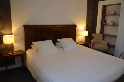 Un ou plusieurs lits dans un hébergement de l'établissement Hotel de Bourgogne
