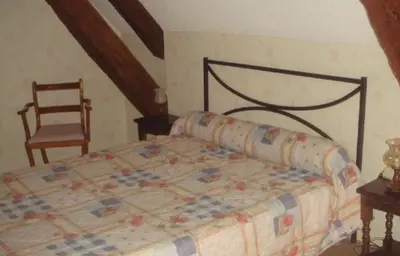 Un ou plusieurs lits dans un hébergement de l'établissement Moulin de Bourgchateau