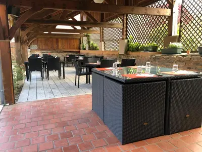 Restaurant ou autre lieu de restauration dans l'établissement Auberge du Renard'eau