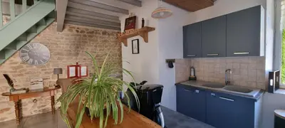 Cuisine ou kitchenette dans l'établissement Meublé de tourisme 