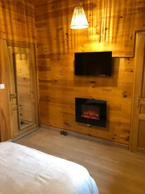 Télévision ou salle de divertissement dans l'établissement Chambres d'Hôte Dijon Clair de Lune Adults Only