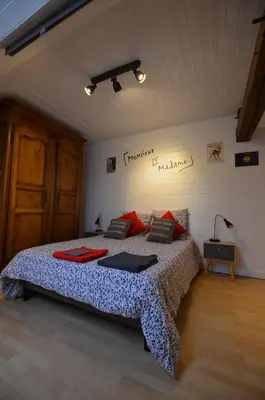 Un ou plusieurs lits dans un hébergement de l'établissement Les chambres de Marie'O