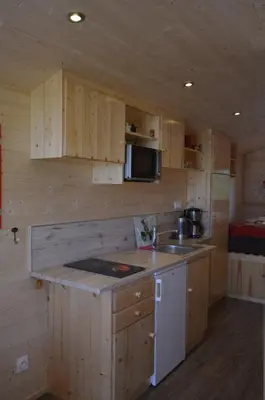 Cuisine ou kitchenette dans l'établissement Les chambres de Marie'O