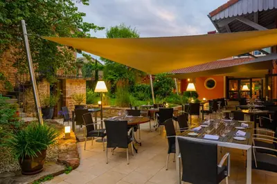 Restaurant ou autre lieu de restauration dans l'établissement Le Moulin du Gastronome