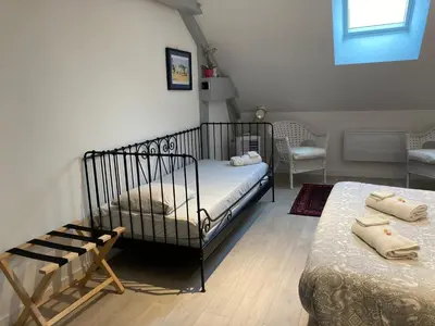 Un ou plusieurs lits dans un hébergement de l'établissement Chambres d'hotes Maison Gille