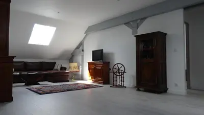 Télévision ou salle de divertissement dans l'établissement Chambres d'hotes Maison Gille