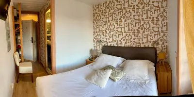 Un ou plusieurs lits dans un hébergement de l'établissement Hôtel Gambetta