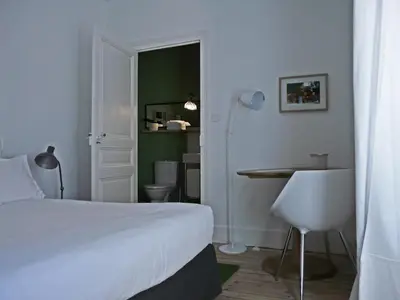 Un ou plusieurs lits dans un hébergement de l'établissement Hôtel Courtille de Solutré