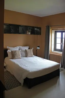 Un ou plusieurs lits dans un hébergement de l'établissement Hôtel Courtille de Solutré