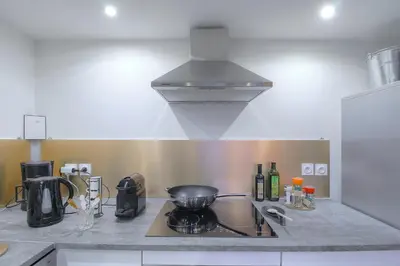 Cuisine ou kitchenette dans l'établissement Academy's Loft