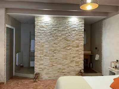 Un ou plusieurs lits dans un hébergement de l'établissement Domaine de Vandenesse Et Spa