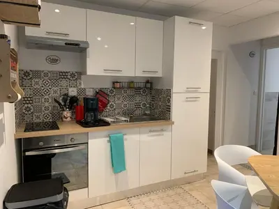 Cuisine ou kitchenette dans l'établissement La Maison Clémenso