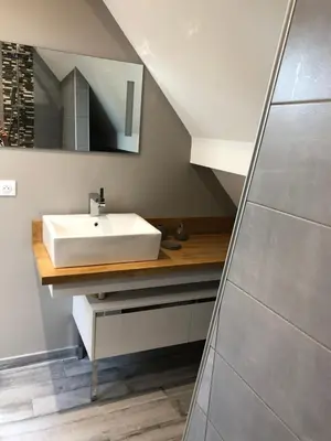 Salle de bains dans l'établissement Le jardin des Arums