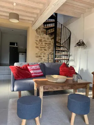 Coin salon dans l'établissement Gîte de la Pisserotte