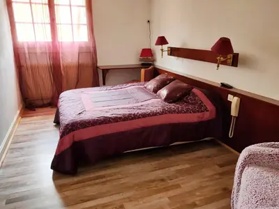 Un ou plusieurs lits dans un hébergement de l'établissement Auberge du val d’ouche